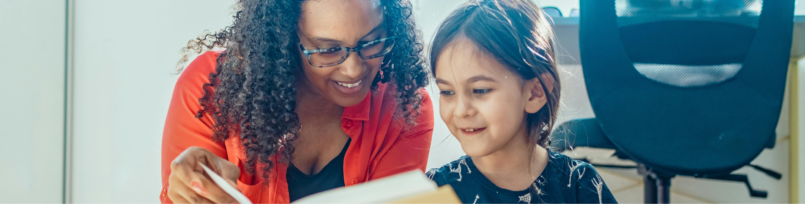 adult and child reading together